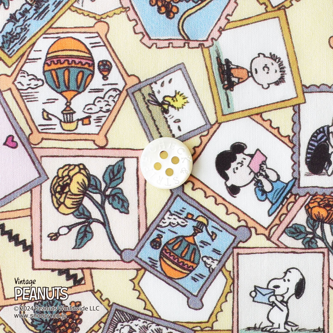 リバティプリントラミネート(レシピ付き)　Stamp Collection J24D(イエロー系)
