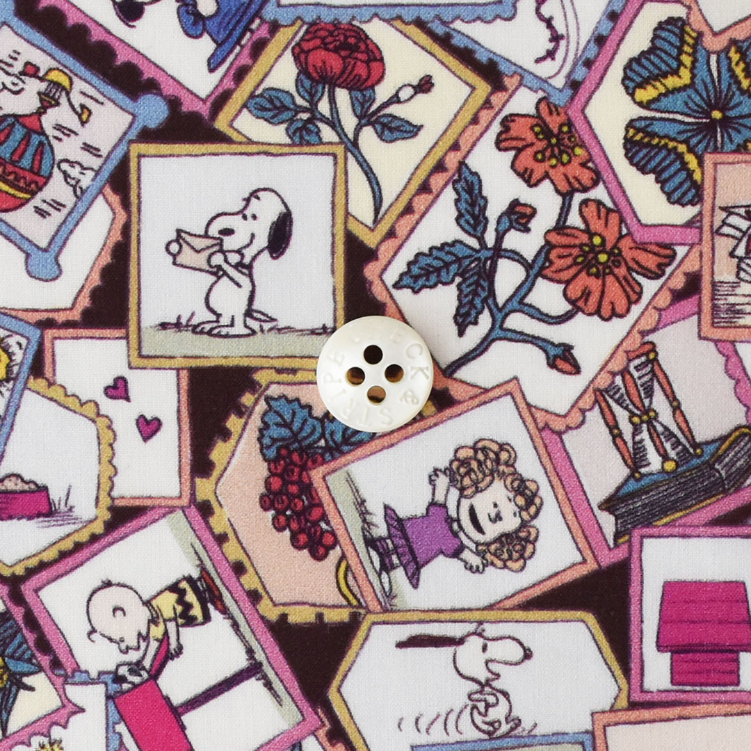 リバティプリント　Stamp Collection J25D(ブラウンにピンク)